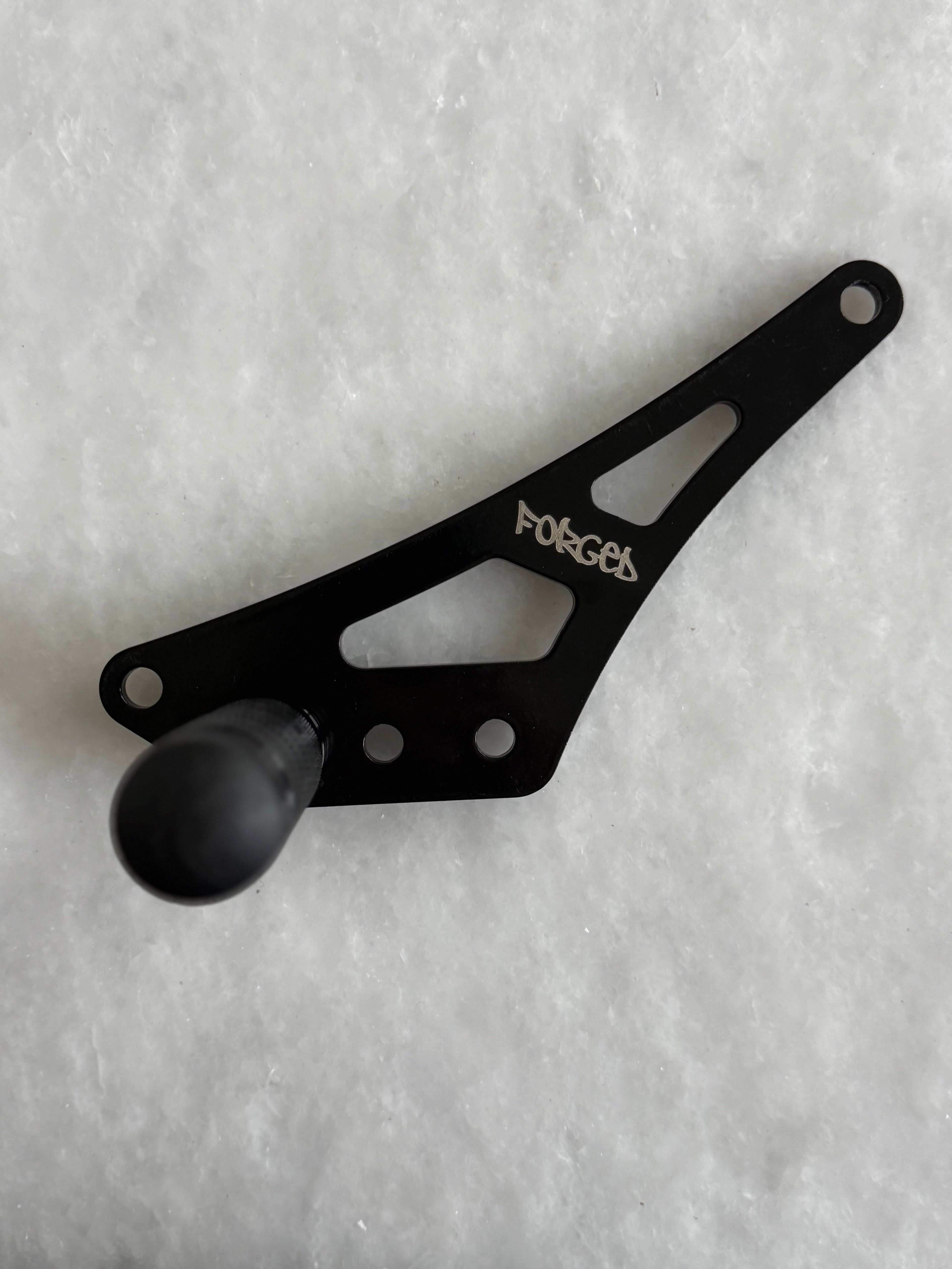 Forged Racing Talaria XXX Bracket Footlock with sturdy design and adjustable features for secure foot placement.