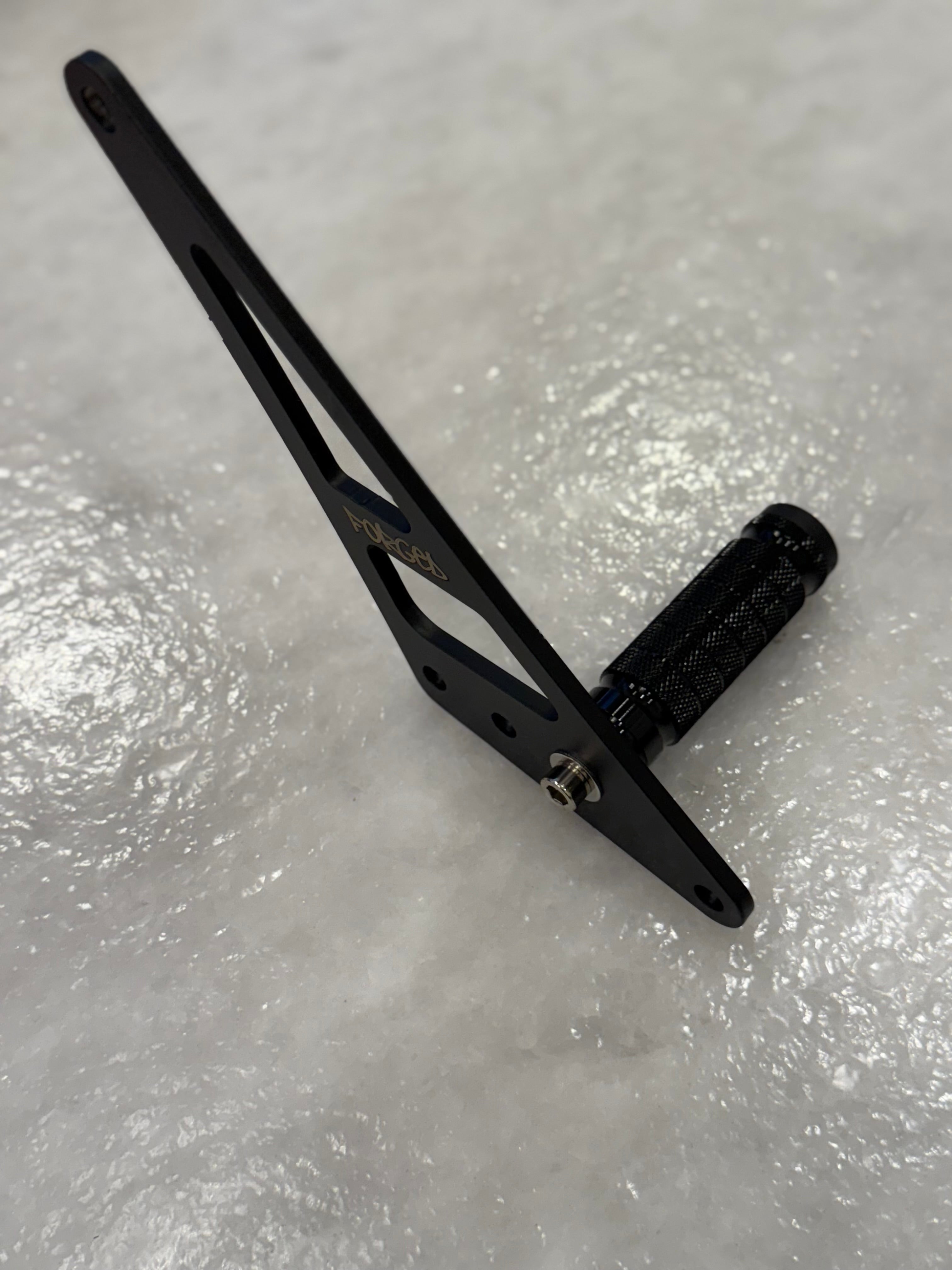 Forged Racing Talaria XXX Bracket Footlock displayed on a white background, showcasing its sleek design and robust build.