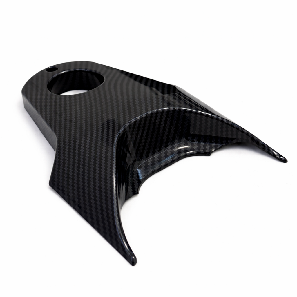 Soleil Supplies Tuttio carbon fiber frame cover showing sleek black carbon fiber surface and precise fit design.