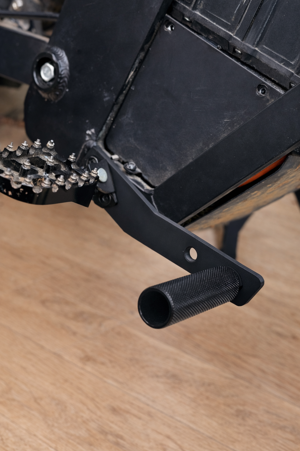 Volt Racing Tuttio Foot Lock, a compact racing foot lock device with adjustable straps for secure pedal control.
