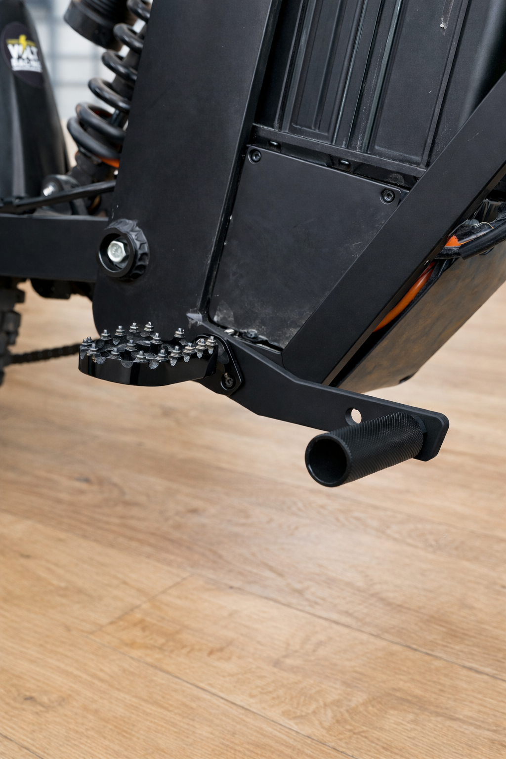 Volt Racing Tuttio Foot Lock showing its sturdy metal construction and adjustable lock mechanism for secure foot positioning.