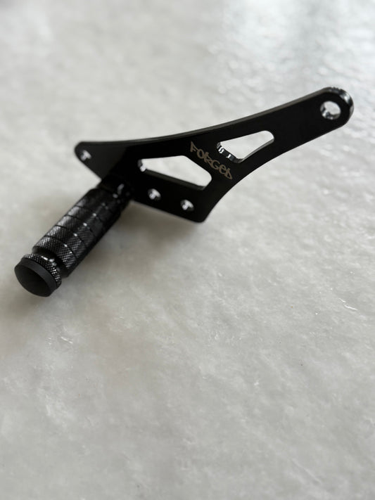 Forged Racing Talaria XXX Bracket Footlock featuring a durable design for secure foot positioning in racing applications.