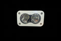 South Coast Moto Baja Light Cover showing durable, black protective cover for motorcycle Baja lights on a vehicle.